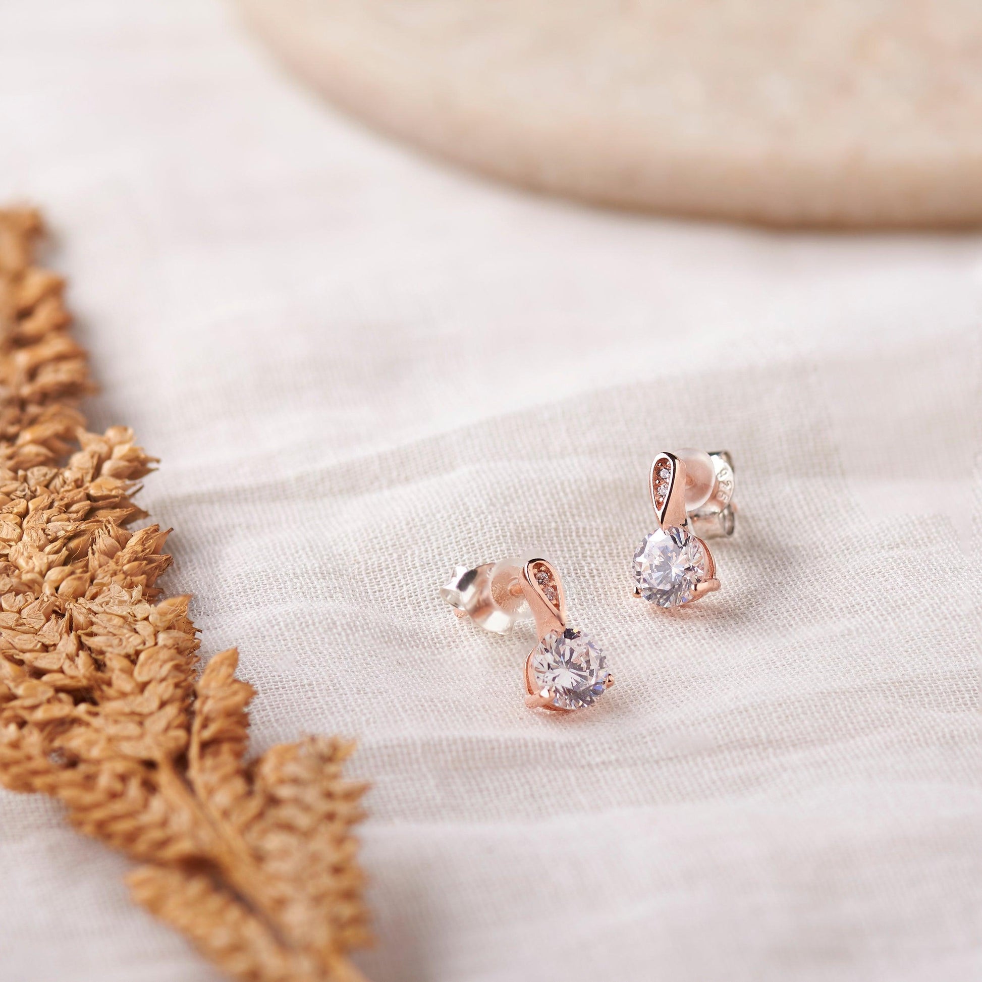 Rose Gold Floating Solitare Studs (Earrings) Dhanaza