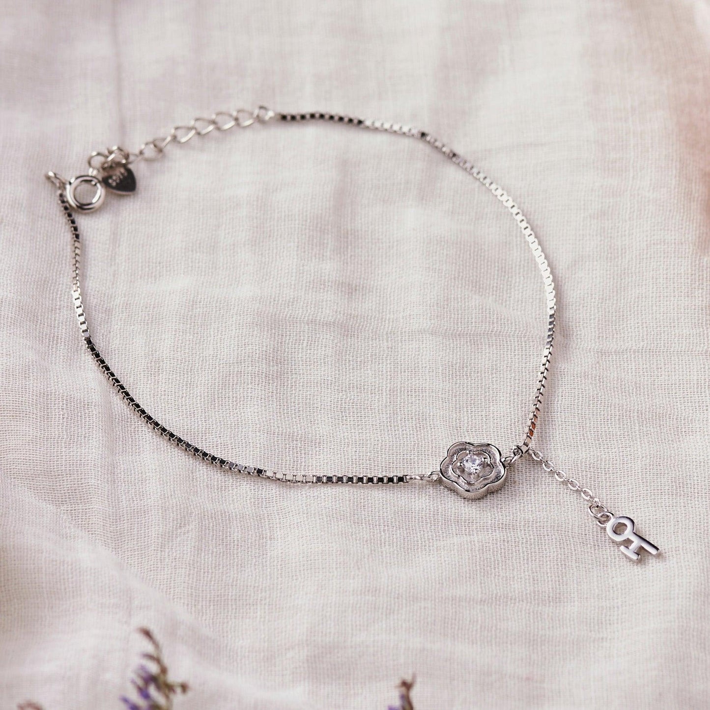 Silver Flower and Key Bracelet Dhanaza